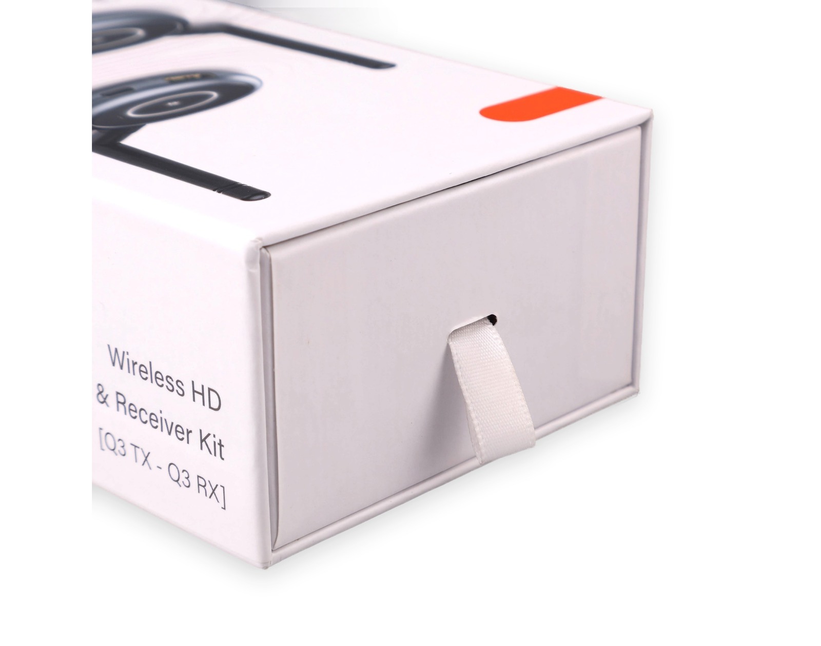 Pull ribbon detail on drawer-style electronics packaging