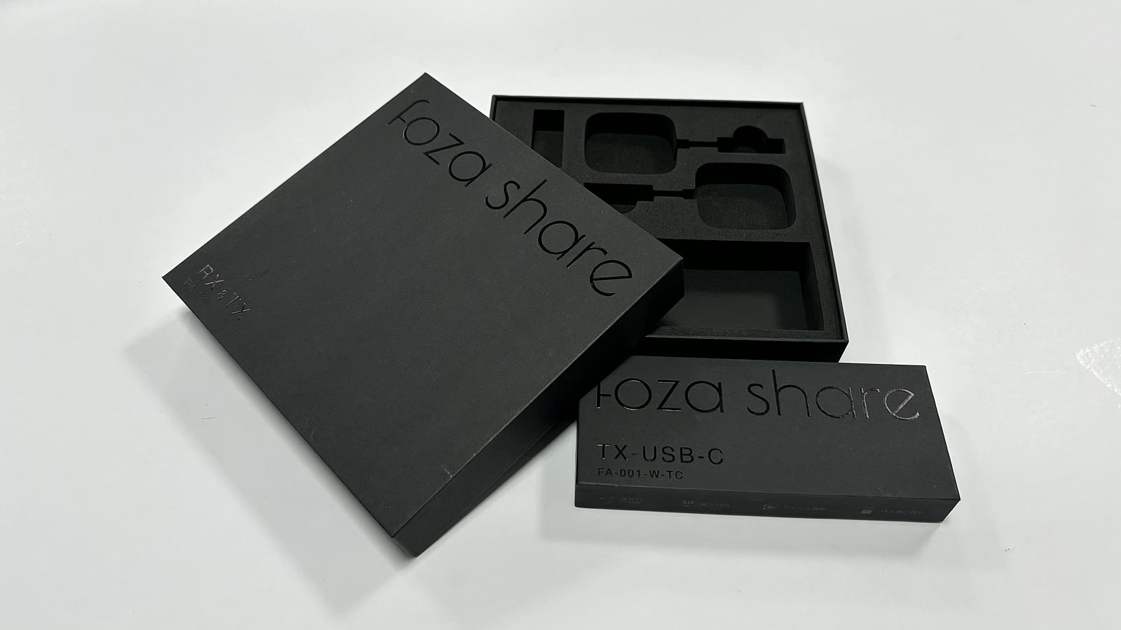 Black rigid paper box with custom insert layout